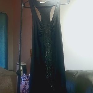 Sleeveless shirt with beading